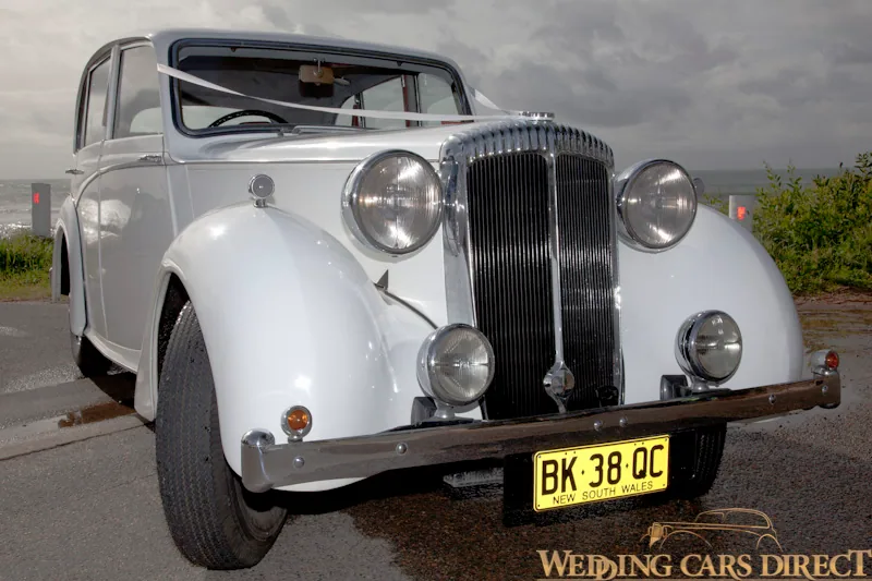 White Chrysler wedding car front angle