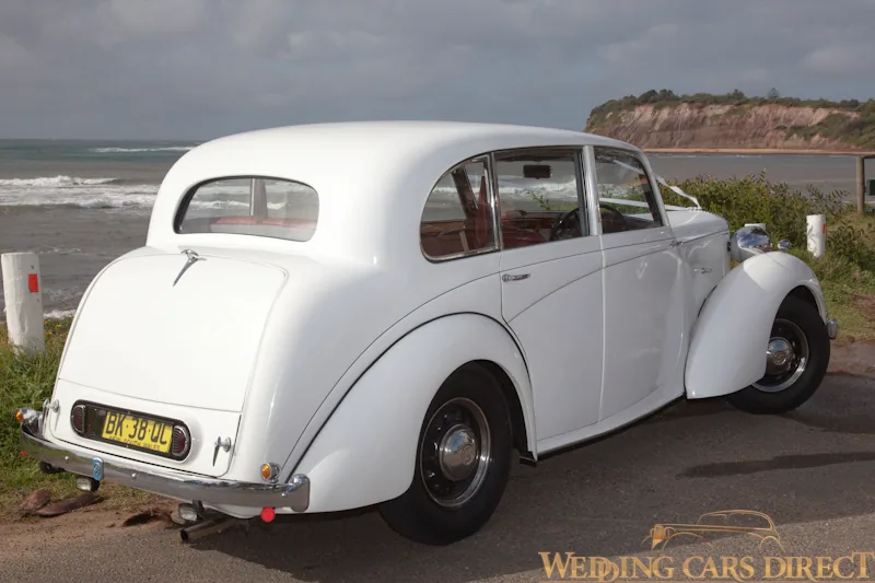 White Chrysler wedding car rear view