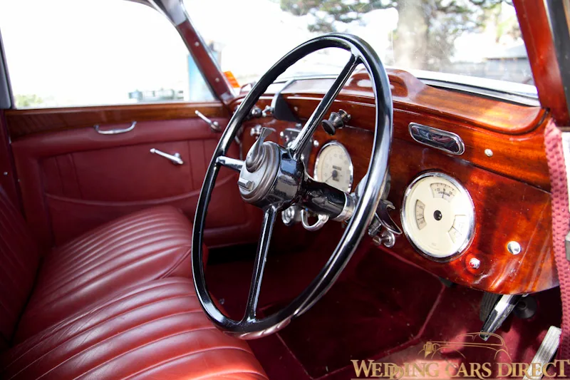 White Chrysler wedding car passenger interior