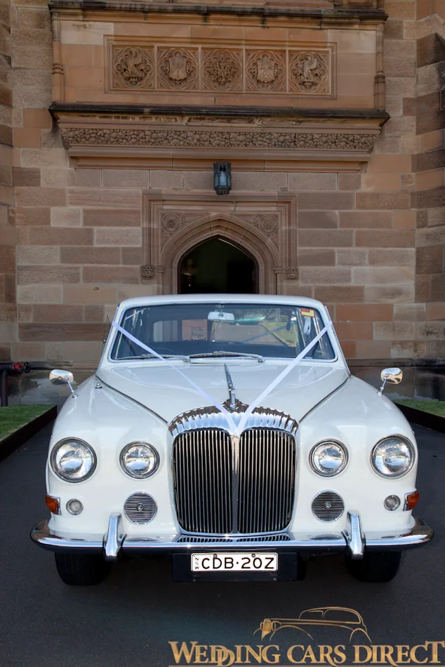 Front view of white Jaguar wedding car